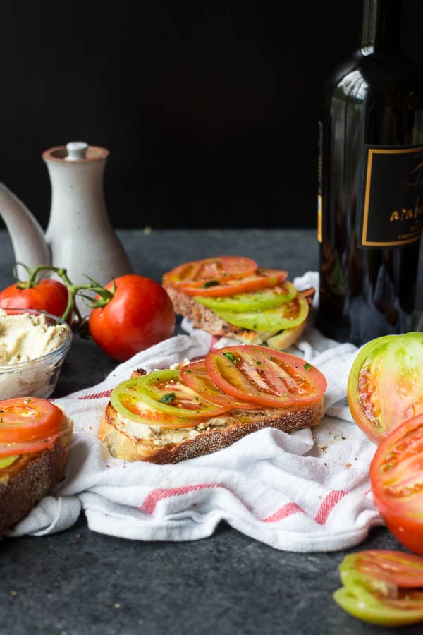 Grilled Bread with Tomatoes and Cashew Ricotta: a 15-minute dinner, appetizer, breakfast, or any-time meal! Naturally gluten free & vegan! || fooduzzi.com recipe